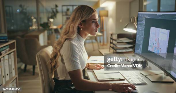business woman, night and graphic designer on computer in office at table working on deadline. creative, serious and professional at desk, editing photo on software and focus on retouching in startup - graphic designer stock pictures, royalty-free photos & images