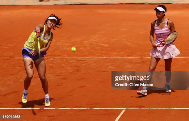 Shuai Peng of China and Su-Wei Hsieh of Taipei in action against Sara Errani and Roberta Vinci of Italy during their final match on day eight of the...