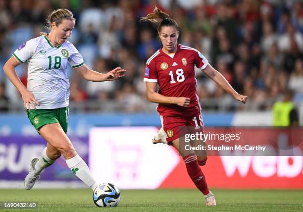 Budapest , Hungary - 26 September 2023; Kyra Carusa of Republic of Ireland in action against Laura Kovács of Hungary during the UEFA Women's Nations...