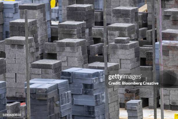 concrete blocks on a construction site - blocco di cemento foto e immagini stock