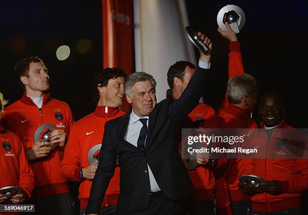 Manager Carlo Ancelotti looks on after the Ligue 1 match between Paris Saint-Germain FC and Stade Brestois 29 at Parc des Princes on May 18, 2013 in...