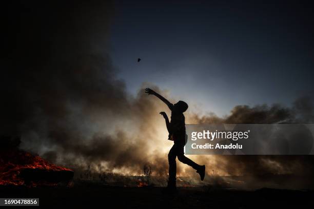 Palestinians set tires on fire and throw gas bombs during the demonstration that has been going on for a week against Israeli forces' violations...