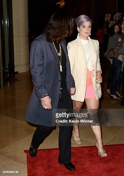 Singer Ozzy Osbourne and his daughter Kelly Osbourne arrive at An Evening With Women benefiting The L.A. Gay & Lesbian Center at the Beverly Hilton...