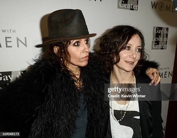 Producer/musician Linda Perry and actress Sara Gilbert arrive at An Evening With Women benefiting The L.A. Gay & Lesbian Center at the Beverly Hilton...