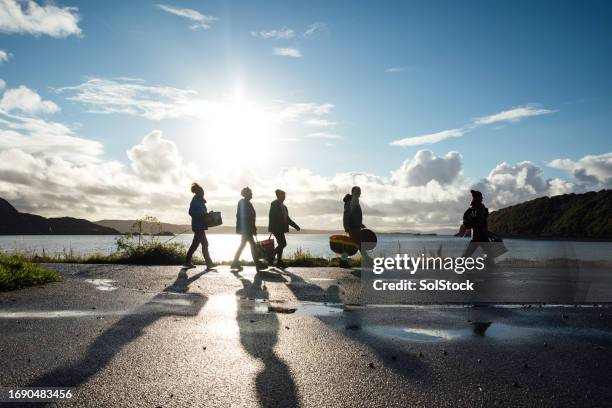 sunshine seekers - lakeshore stock pictures, royalty-free photos & images