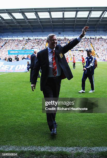 Manchester United manager Sir Alex Ferguson waves prior his 1,500th and final match in charge of the club prior to the Barclays Premier League match...