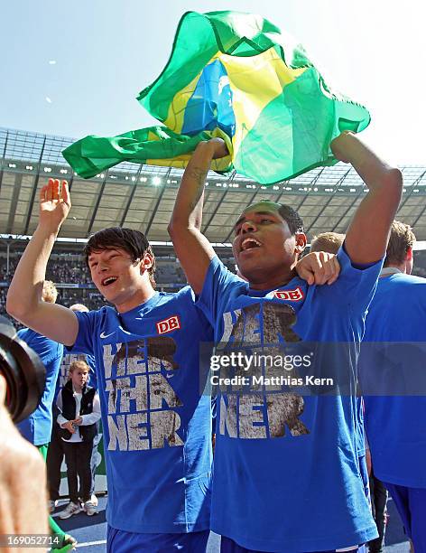 Ronny of Berlin and team mate Nico Schulz celebrate winning the championship after the Second Bundesliga match between Hertha BSC Berlin and FC...