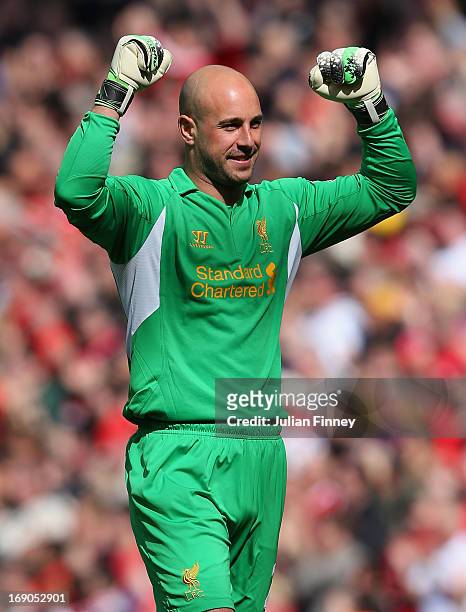 Pepe Reina of Liverpool celebrates the opening goal during the Barclays Premier League match between Liverpool and Queens Park Rangers at Anfield on...