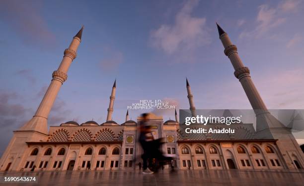 View of the illuminated message, known as 'mahya', hung between two minarets of the Grand Camlica Mosque during the celebrations for Mawlid al-Nabi,...