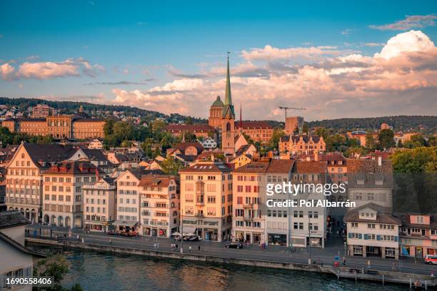 aerial panoramic sunset view of zurich old town cityscape in switzerland - zurich foto e immagini stock
