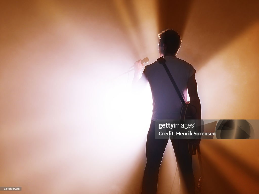 Musician performing on stage