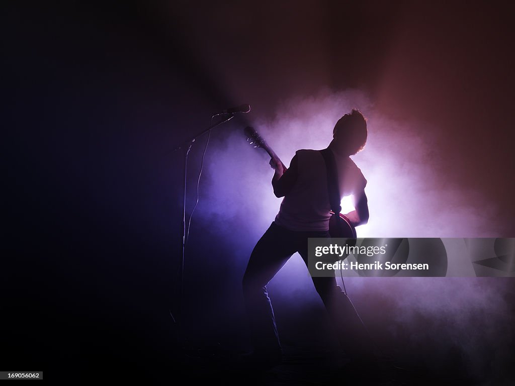 Guitarist performing on stage