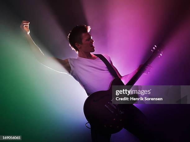 Guitarist Performing On Stage, Stockfoto