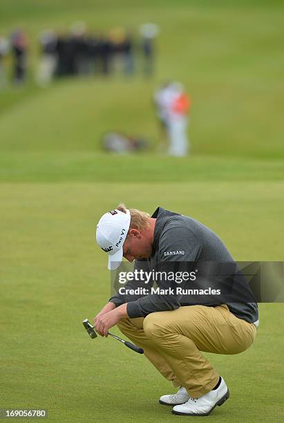 Morten Orum Madsen of Denmark reacts on the 18th green during the final round of the Madeira Islands Open - Portugal - BPI at Club de Golf do Santo...