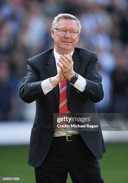 Manchester United manager Sir Alex Ferguson applauds the crowd after his 1,500th and final match in charge of the club following the Barclays Premier...