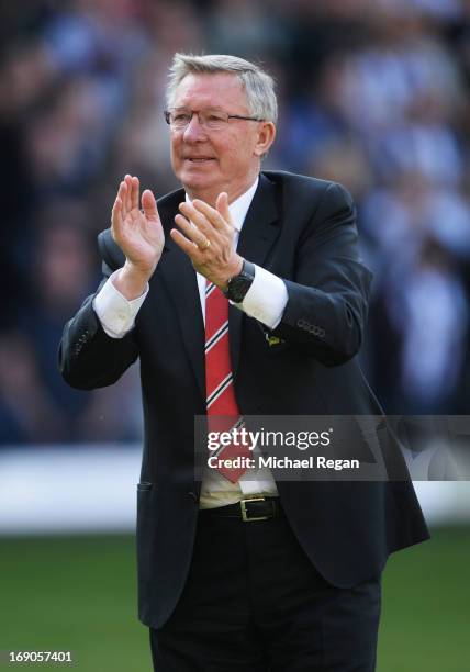 Manchester United manager Sir Alex Ferguson applauds the crowd after his 1,500th and final match in charge of the club following the Barclays Premier...