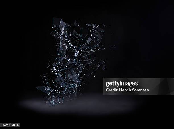 shattering glass - broken window stockfoto's en -beelden