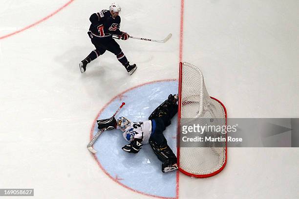 Alex Galchenyuk of USA scores his team's winning goal during penalty shut out during the IIHF World Championship third place match between Finland...