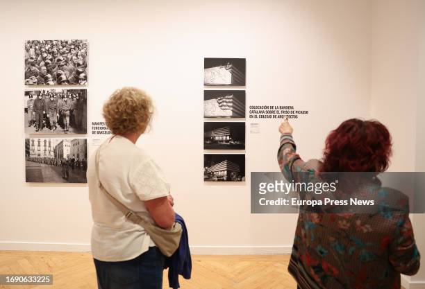 Two women look at some of the works at the presentation of the exhibition 'Memoria vivida' by Pilar Aymerich, at the Circulo de Bellas Artes, on 19...