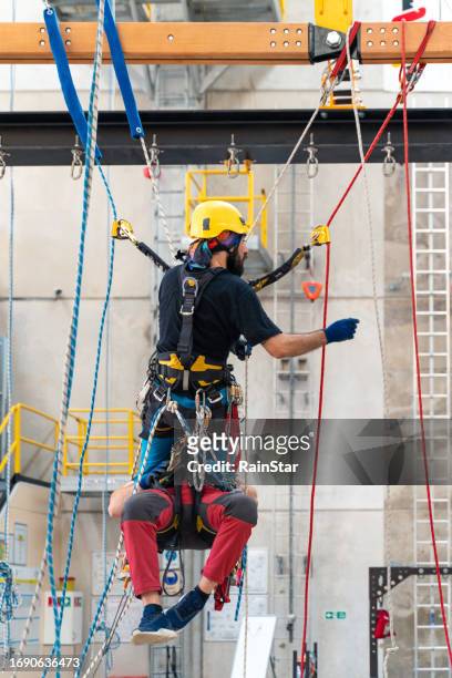 climbers doing rescue training - rope high rescue imagens e fotografias de stock