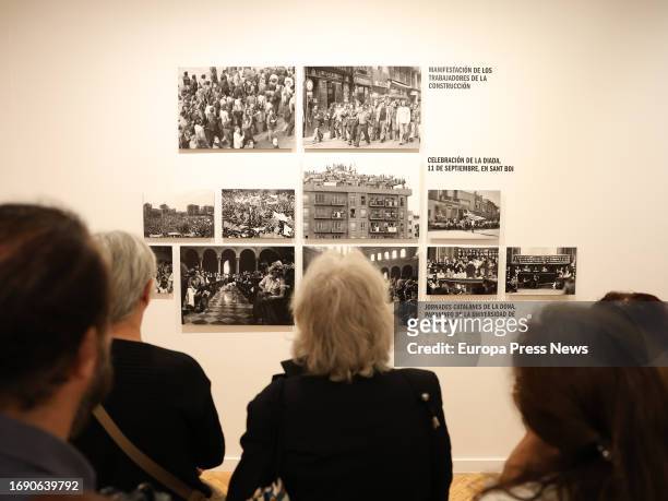 Several people look at some of the works at the presentation of the exhibition 'Memoria vivida' by Pilar Aymerich, at the Circulo de Bellas Artes, on...