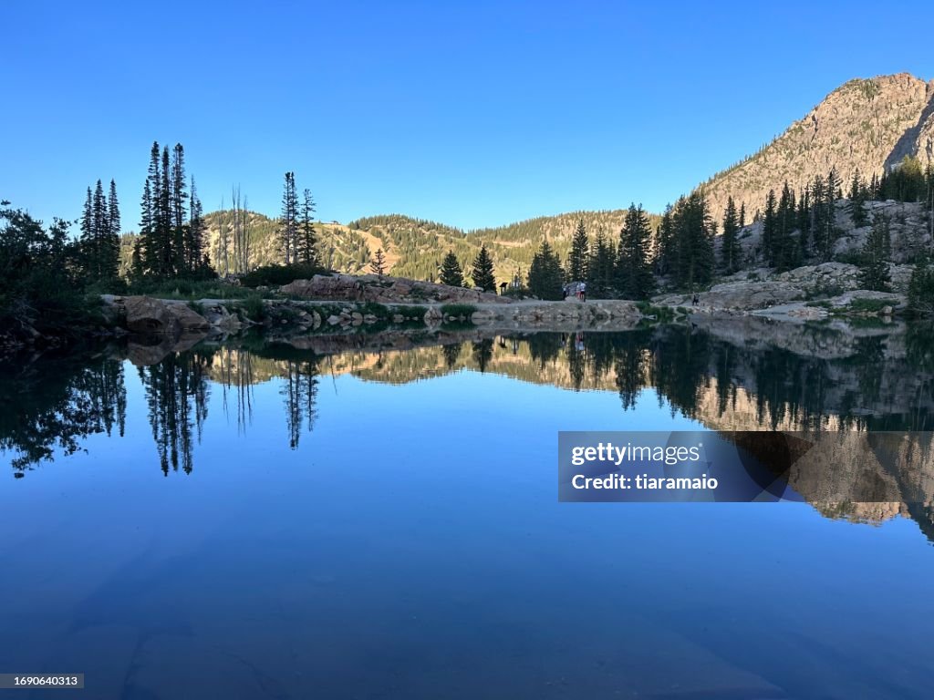 Wasatch Mountain reflections in Cecret Lake, Alta, Utah, USA