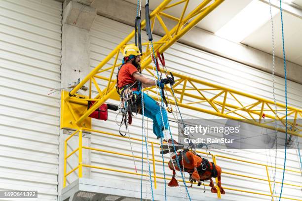 climbers doing rescue training - gateway high school stock pictures, royalty-free photos & images