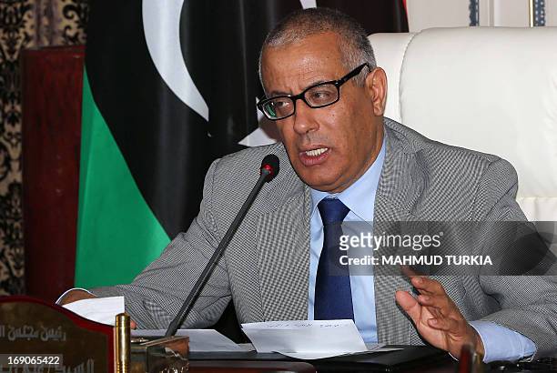 Libyan Prime Minister Ali Zeidan gives a press briefing on the security situation on May 19, 2013 in Tripoli. A bomb exploded on May 18, in a Tripoli...