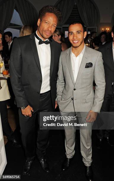 Actor Gary Dourdan and Formula 1 driver Lewis Hamilton attend the exclusive "For The Love Of Cinema" event hosted by Swiss luxury watch manufacturer...