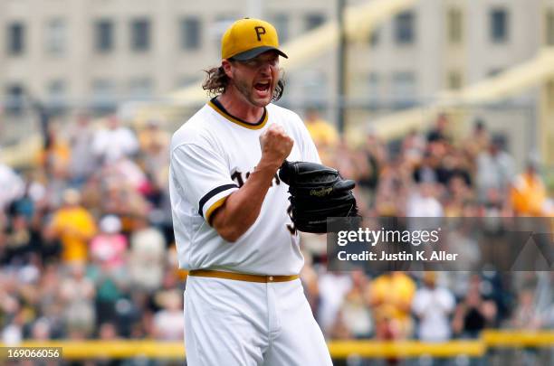 Jason Grilli of the Pittsburgh Pirates celebrates after defeating the Houston Astros during the game on May 19, 2013 at PNC Park in Pittsburgh,...
