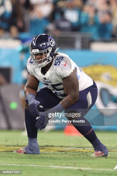 Aaron Brewer of the Tennessee Titans in a two-point stance on the line of scrimmage against the Jacksonville Jaguars during the game at TIAA Bank...