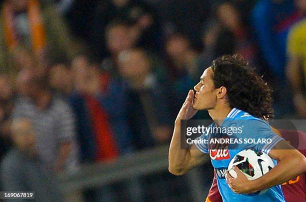 Napoli's Uruguayan striker Edinson Cavani celebrates after scoring a goal during the Italian Serie A football match AS Roma vs SSC Napoli on May 19,...