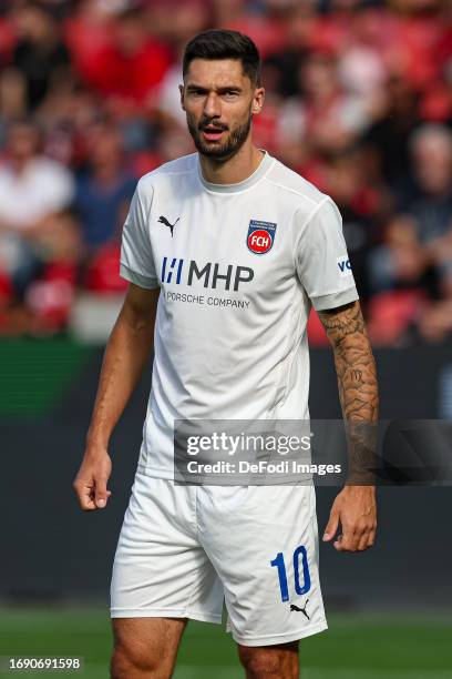 Tim Kleindienst of 1. FC Heidenheim 1846 looks on during the Bundesliga match between Bayer 04 Leverkusen and 1. FC Heidenheim 1846 at BayArena on...