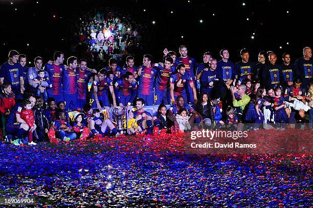 Barcelona players pose with the trophy during the celebration after winning the Spanish League after the La Liga match between FC Barcelona and Real...