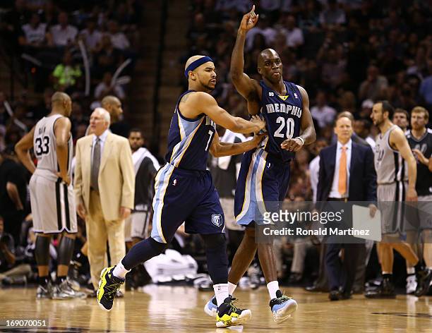 Jerryd Bayless and Quincy Pondexter of the Memphis Grizzlies react in the secon dhalf against the San Antonio Spurs during Game One of the Western...