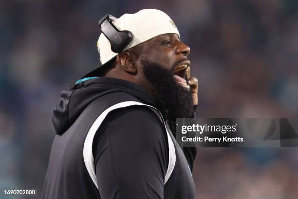 Defensive line coach Brentson Buckner of the Jacksonville Jaguars yells on the sideline against the Tennessee Titans during the game at TIAA Bank...