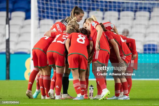 Players of Wales huddle during the UEFA Women's Nations League match between Wales and Denmark at Cardiff City Stadium on September 26, 2023 in...