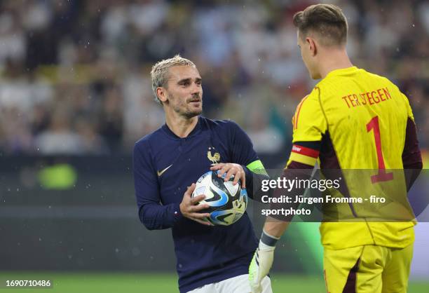 Antoine Griezmann of France and Marc Andre ter Stegen of Germany Gestures after penalty during the international friendly match between Germany and...