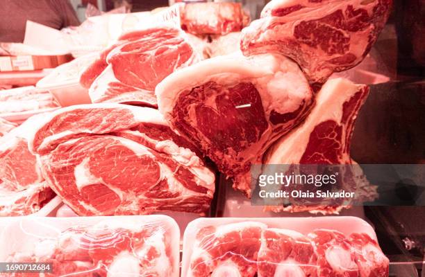 large steaks at a butcher's place - carnivora stock pictures, royalty-free photos & images