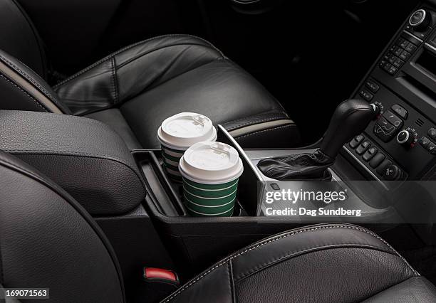 cups in a car holder - passagerarsäte bildbanksfoton och bilder