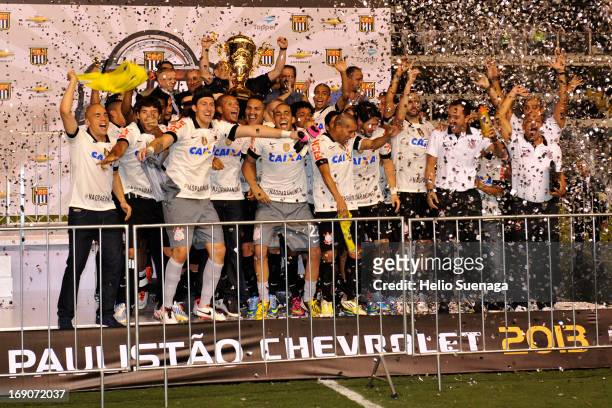 Players of Corinthians celebrate the title of the Paulista Championship 2013 after the match between Santos and Corinthians at Vila Belmiro Stadium...