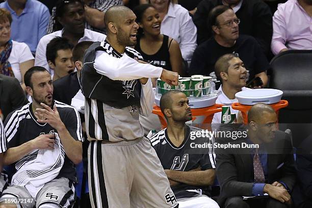 Manu Ginobili , Tim Duncan and Tony Parker of the San Antonio Spurs react on the bench in the secon dhalf against the Memphis Grizzlies during Game...