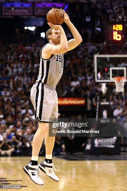 Matt Bonner of the San Antonio Spurs attempts a shot in the second half against the Memphis Grizzlies during Game One of the Western Conference...