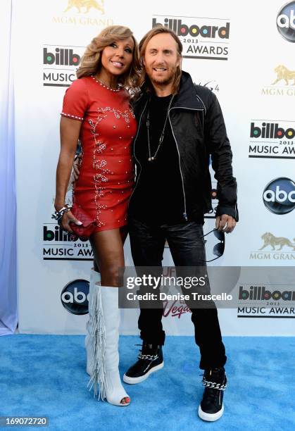 David Guetta and Cathy Guetta arrive at the 2013 Billboard Music Awards at the MGM Grand Garden Arena on May 19, 2013 in Las Vegas, Nevada.