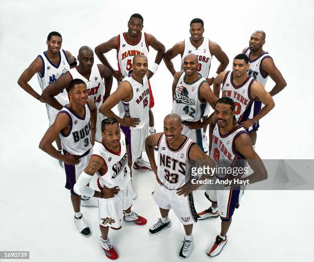 The 2001 NBA East All-Star Team pose for a team portrait, front row : Allen Iverson, Stephon Marbury, Latrell Sprewell. Middle row: Ray Allen, Vince...