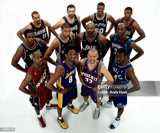 The 2001 NBA West All-Star Team pose for a team portrait, front row : Gary Payton, Kobe Bryant, Jason Kidd, Michael Finley. Middle row: Chris Webber,...