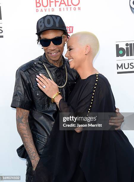 Wiz Khalifa and Amber Rose arrive at the 2013 Billboard Music Awards at the MGM Grand Garden Arena on May 19, 2013 in Las Vegas, Nevada.