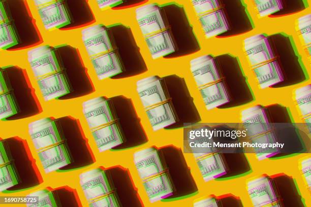 glitch double exposure repeated american dollars banknotes on the yellow background - canadian one hundred dollar bill 個照片及圖片檔