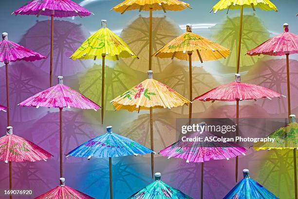 cocktail time - cocktail umbrella stock pictures, royalty-free photos & images