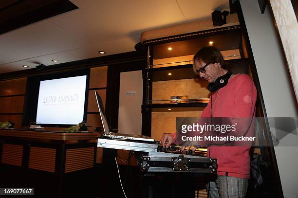 Performs during the Glacier Films launch party hosted by Hayden C and Michael Saylor aboard the Yacht Harle on May 19, 2013 in Cannes, France.